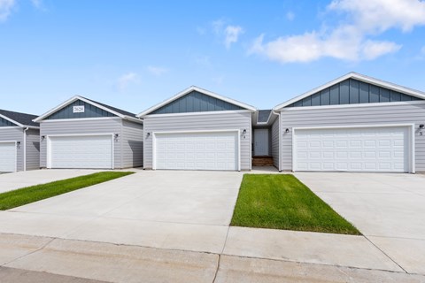 A row of garage doors are closed.