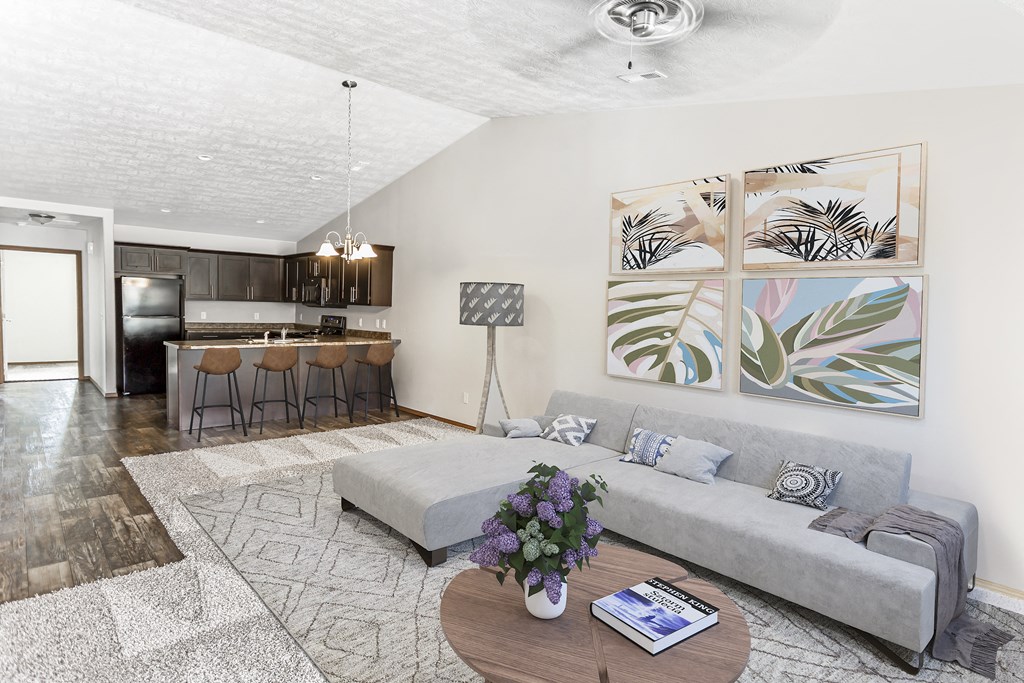 a living room with a couch and a table