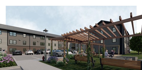 A modern building with a wooden pergola and people sitting on benches.