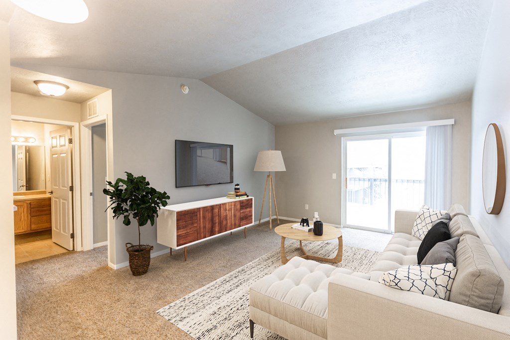 a living room with a couch and a tv
