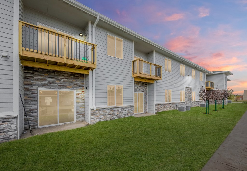the preserve at ballantyne commons exterior of a blue and white building with grass