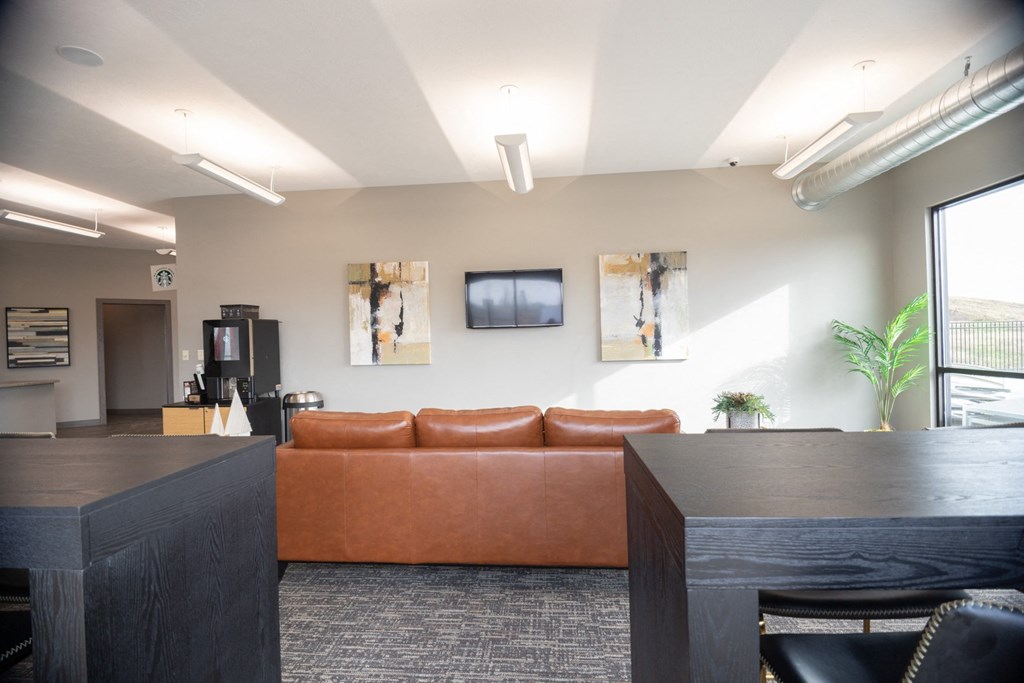 a living room with a couch and a table