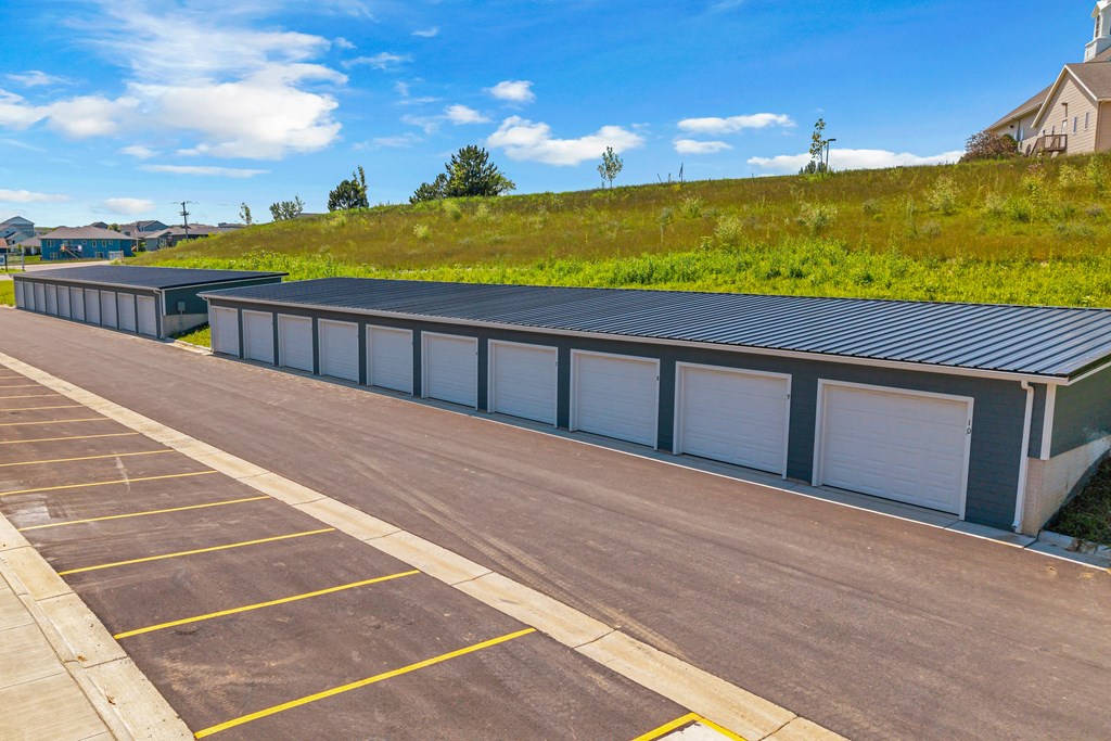 A parking lot with a building in the background.
