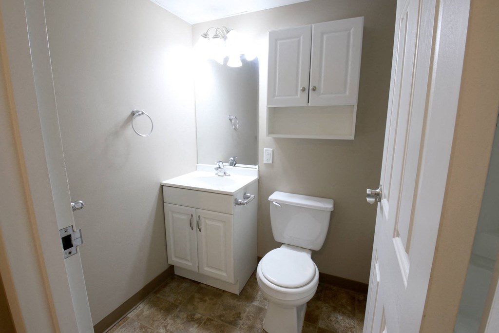 a small bathroom with a toilet and a sink