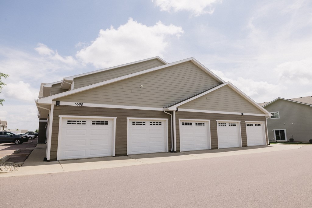 A large garage with four doors is numbered 2980.