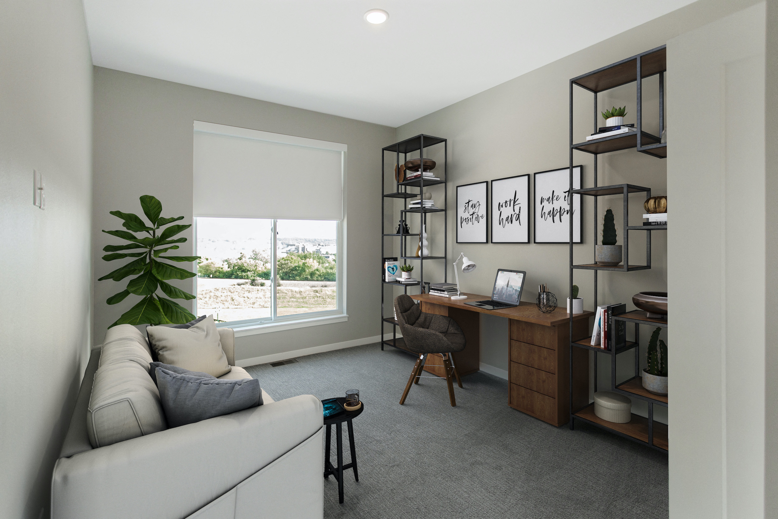 a living room with a couch and a desk with a window