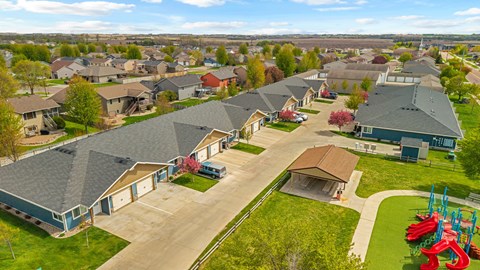 A residential area with houses and a playground.