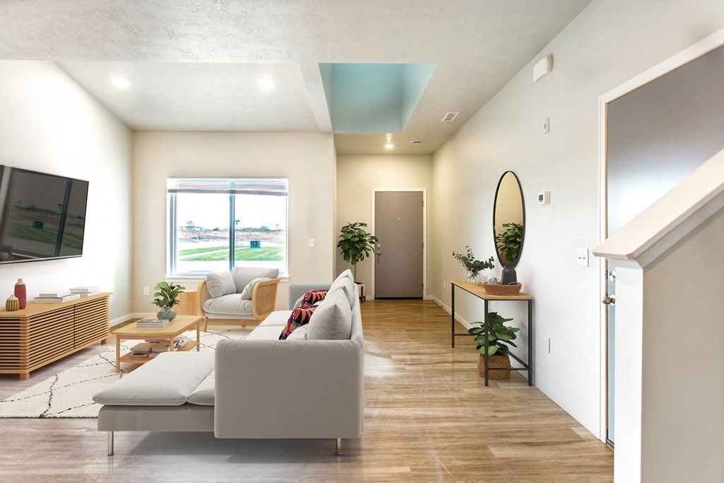 a living room with a couch and a tv