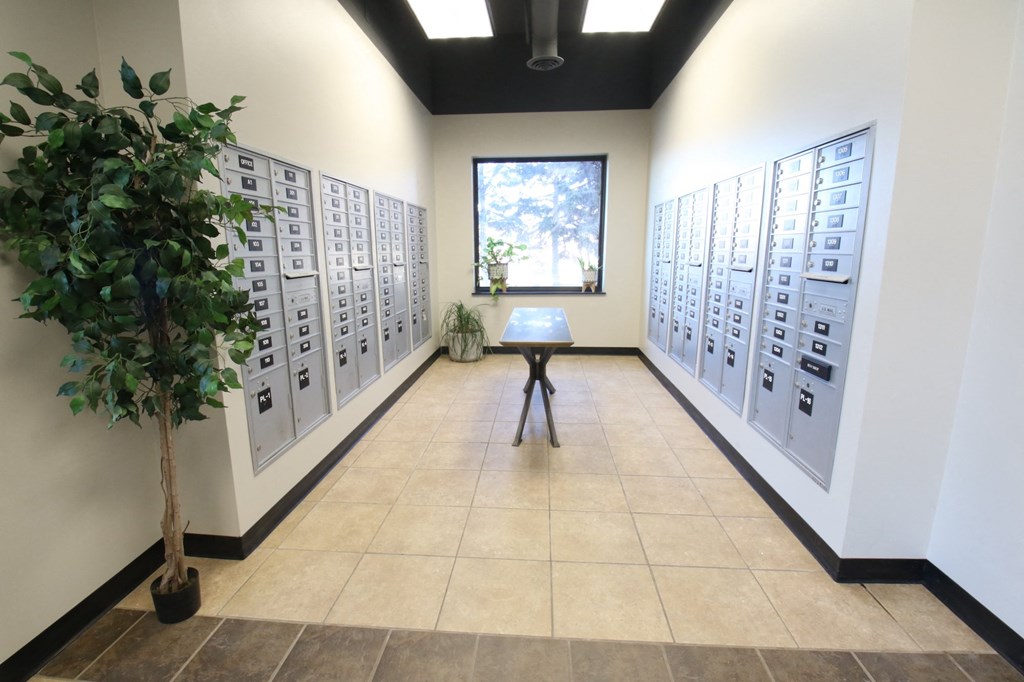 a room with many filing cabinets and a table in the middle of the room