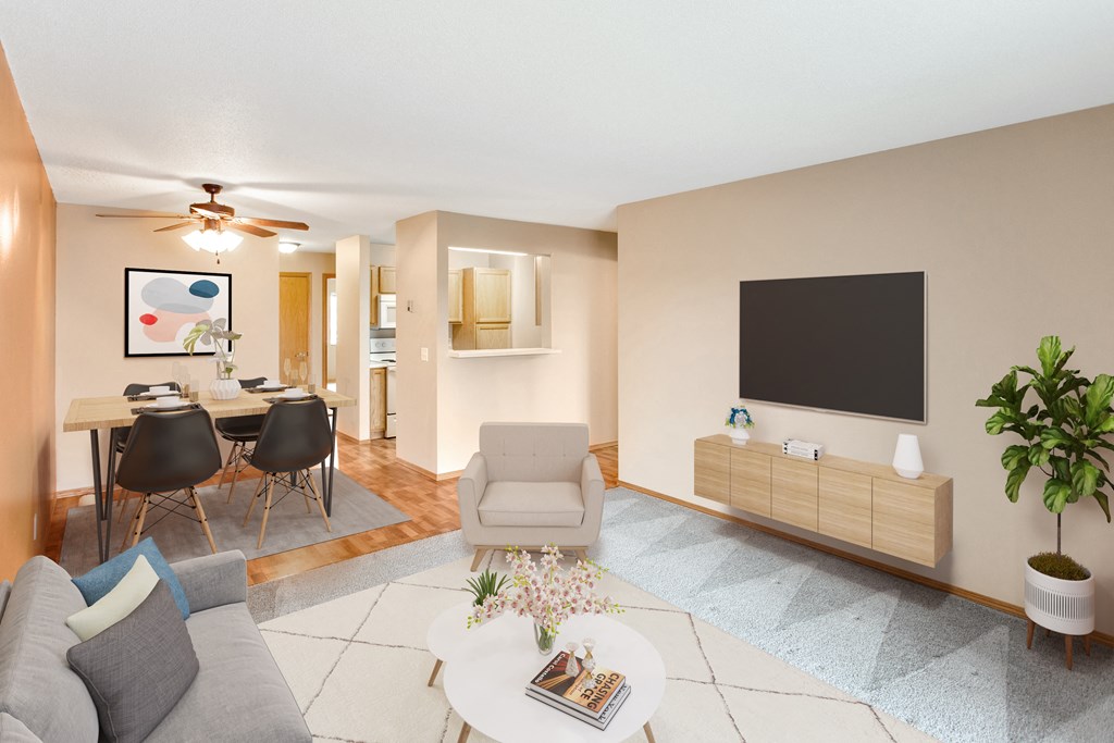 a living room with a couch and a table and a tv