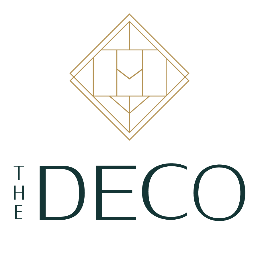 A green poster with a diamond shape and the words "The Deco" written on it.