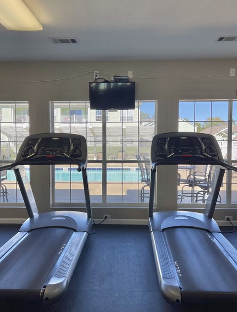 Workout Facility Overlooking Pool Area