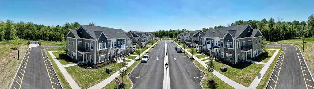 an aerial view of houses on a street