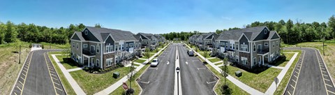 an aerial view of houses on a street