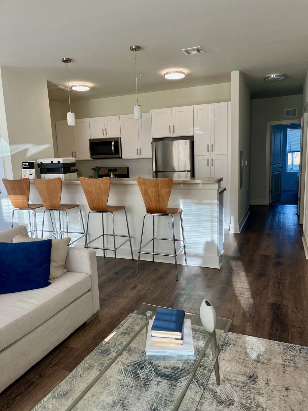 a kitchen and living room