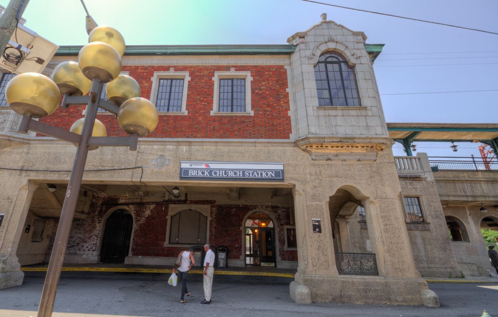 an old building with a street light in front of it