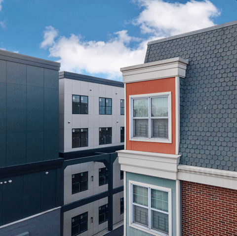 a view of some buildings from the roof of a building