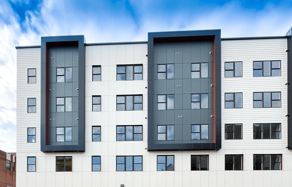 the facade of a modern apartment building