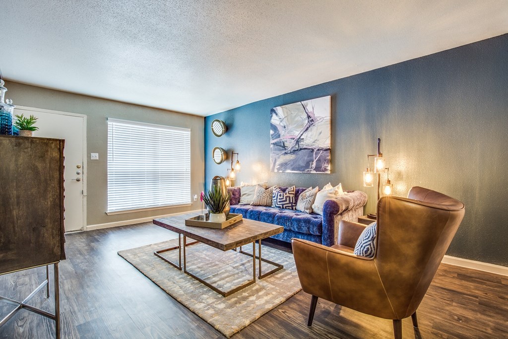 a living room with a couch and a table