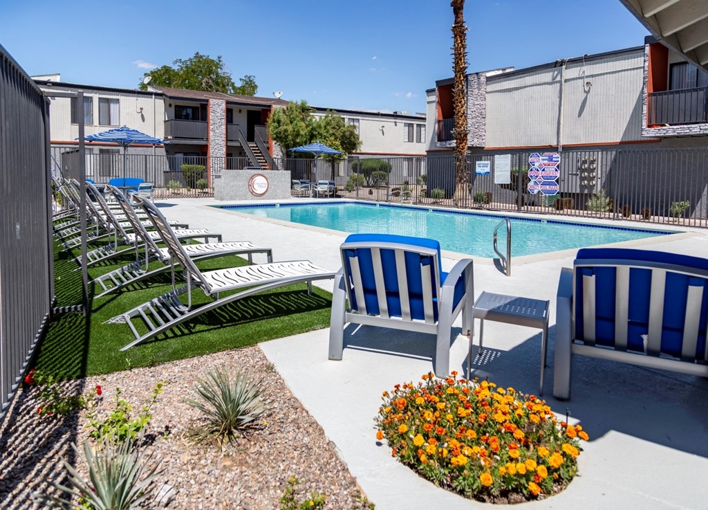 our apartments have a large pool and lounge chairs