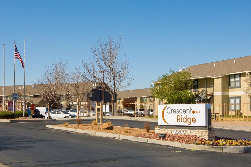 community sign in front of a building