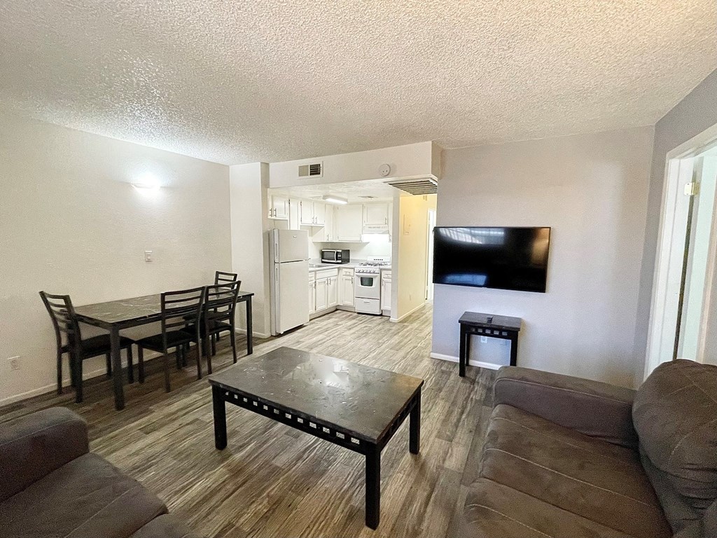 a living room with a couch and a table