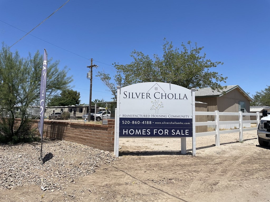 a sign for silver cholla homes for sale