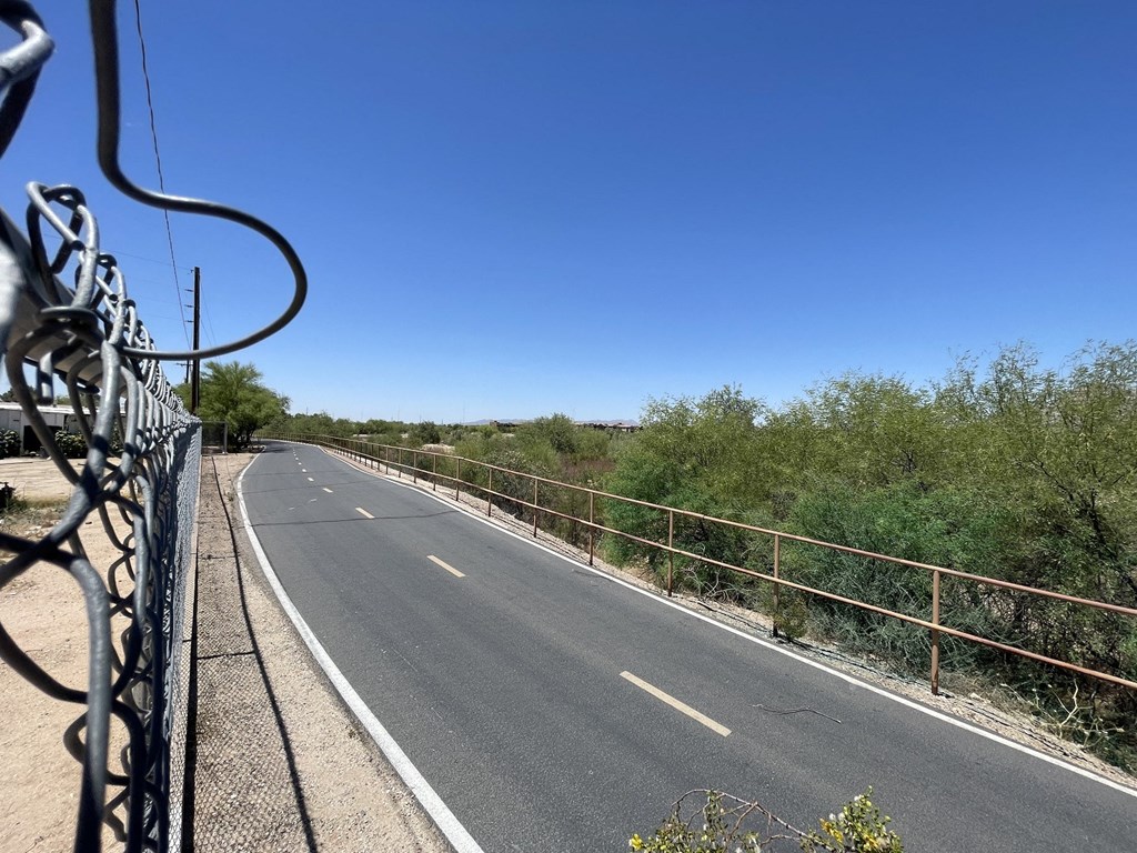 the view of the road from the back of a motorcycle