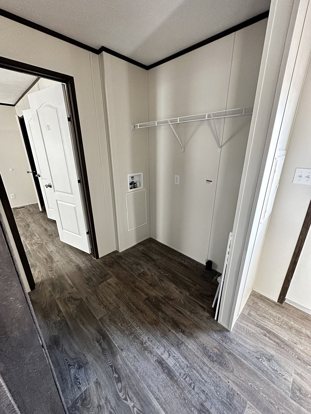 a room with a closet and a mirror in it