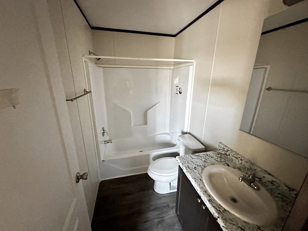 a small bathroom with a toilet and a sink