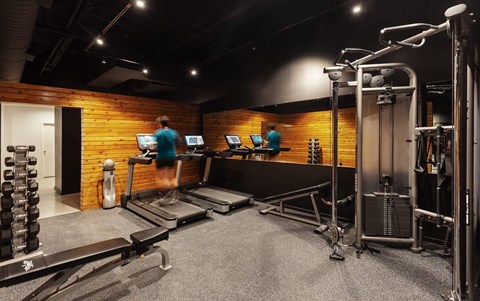 Fitness center with cardio and strength equipment at THE'68 Apartments, Texas, 78205