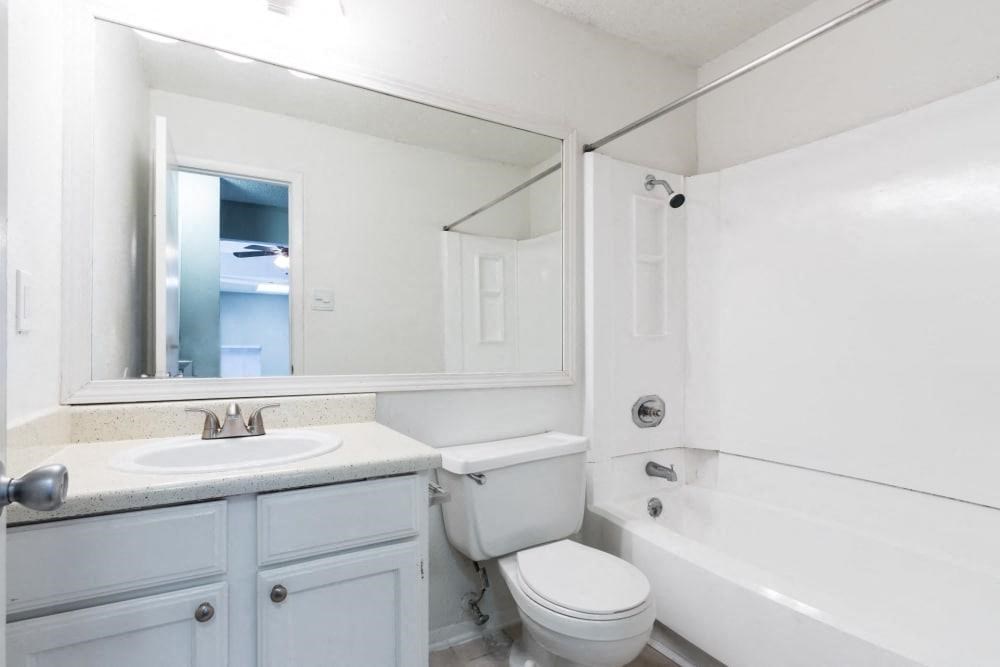 a bathroom with a sink toilet and a bath tub at Northchase, Austin, TX