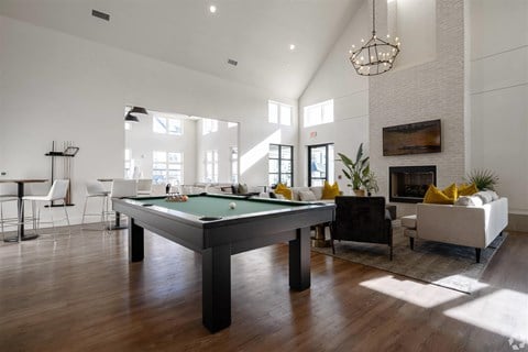 an open living room with a pool table
