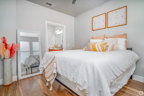 Bedroom with large bed at The Landings at Brooks City-Base, Texas, 78235