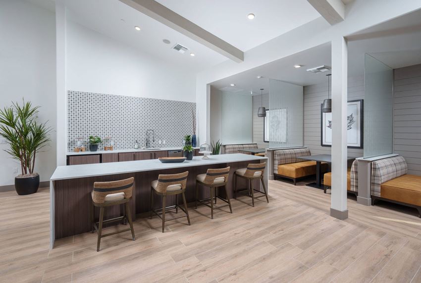 Aurora Apartments clubroom with kitchen area Aurora Apartments clubroom with kitchen area