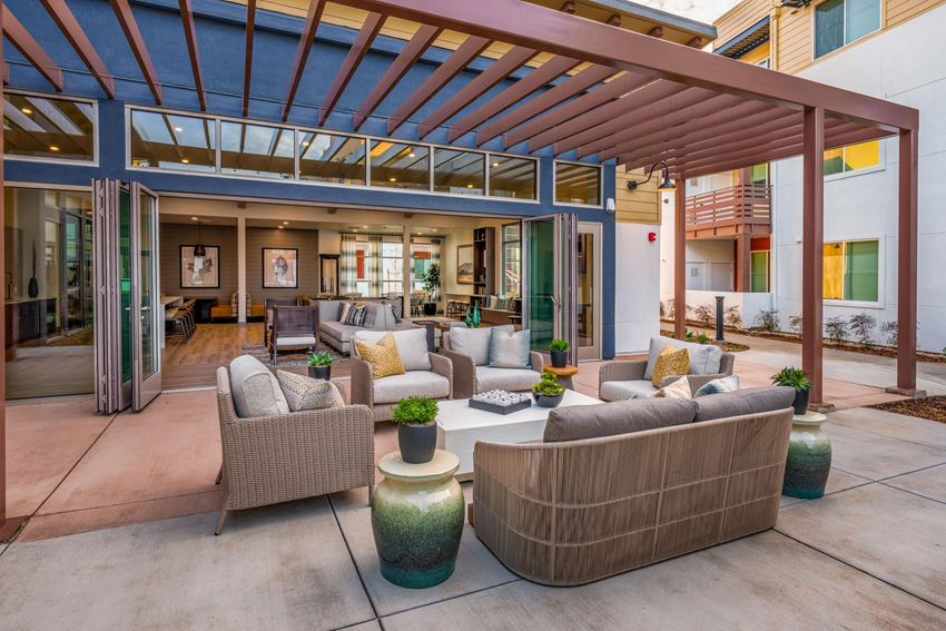 Aurora Apartments outdoor seating area with canopy Aurora Apartments outdoor seating area with canopy