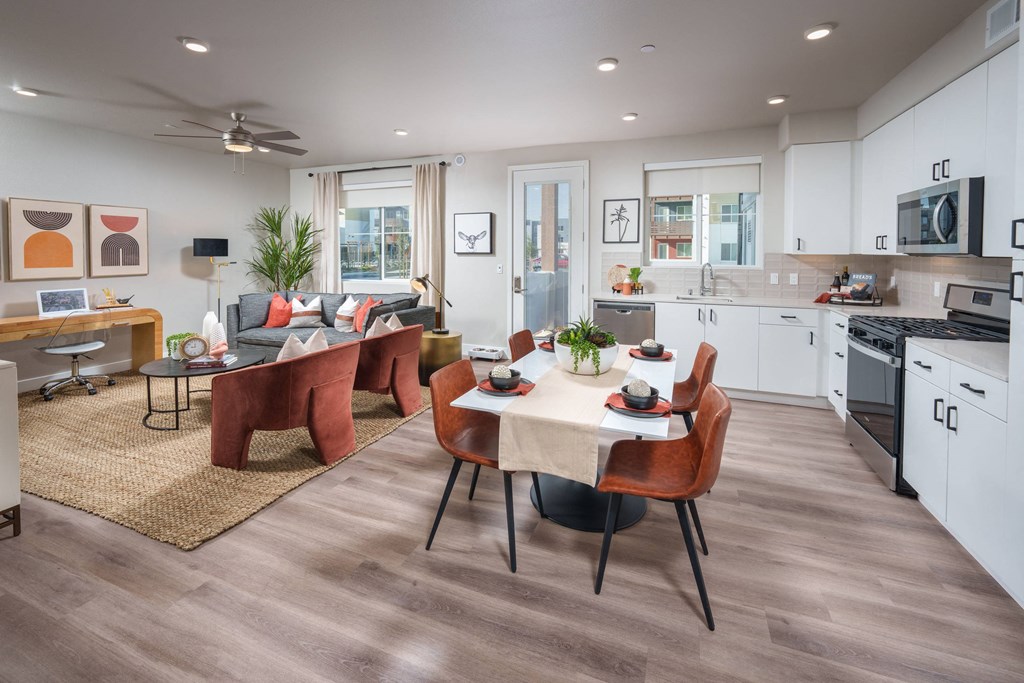 Aurora Apartment model with open floor plan kitchen and living space