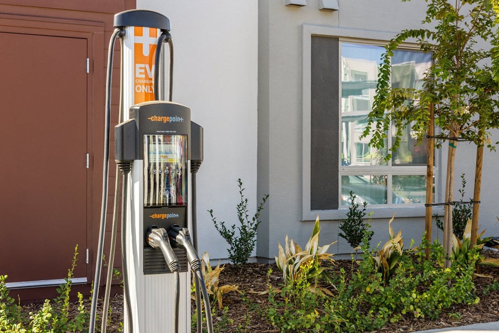 an EV Charging station in front of a building