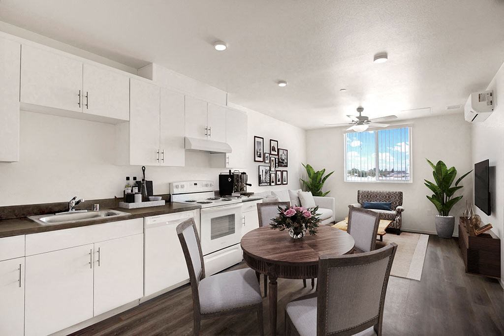 a virtually staged kitchen and dining room with a table and chairs