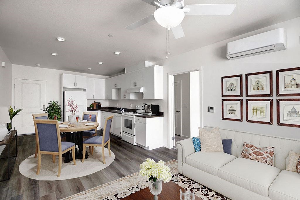 a virtually living room and kitchen with a couch and a table