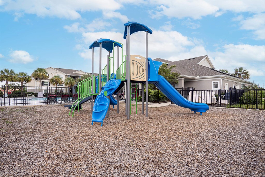 our playground is equipped with a large playset with slides