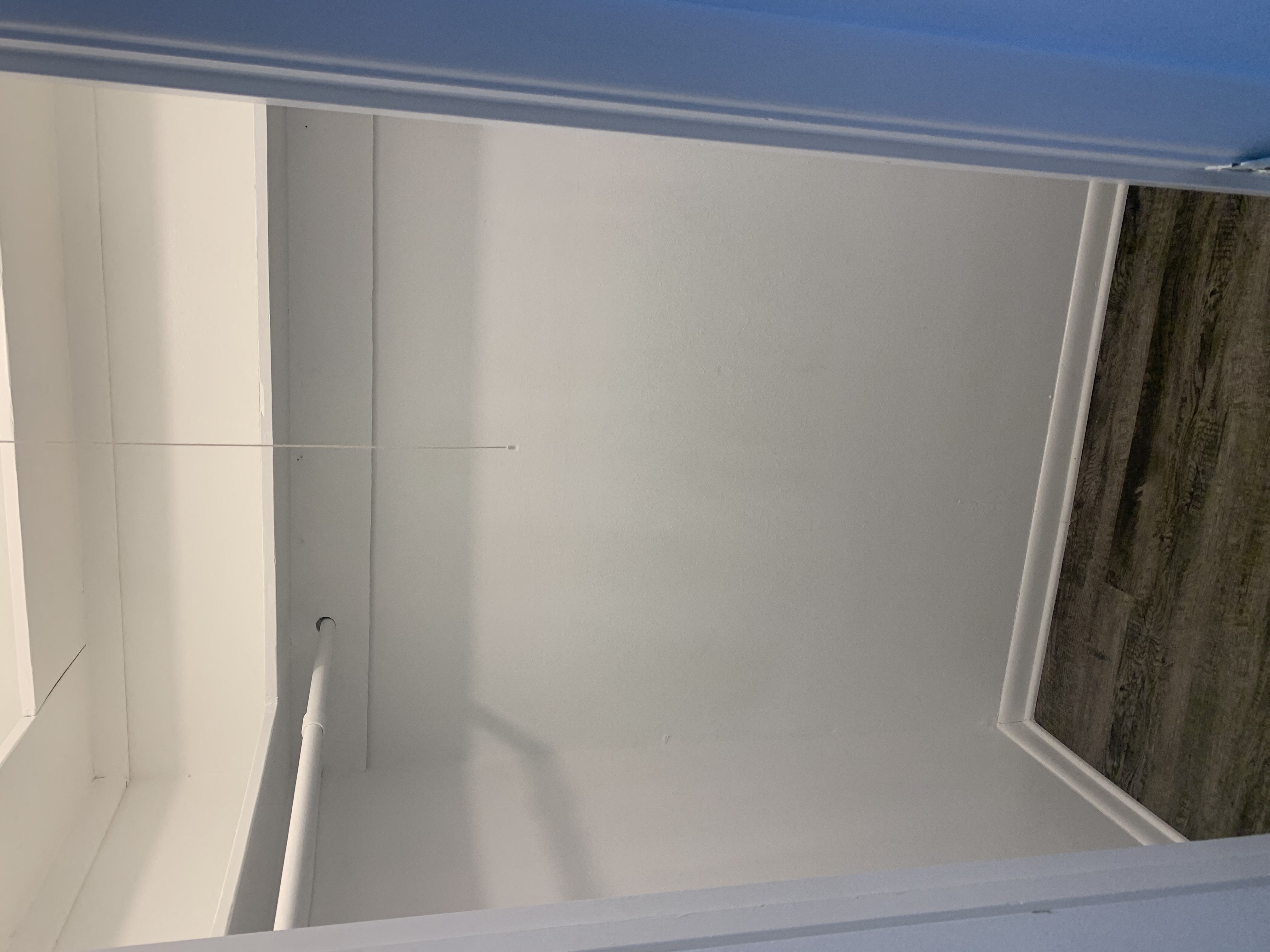 the window in the bathroom is clean and ready for us to use