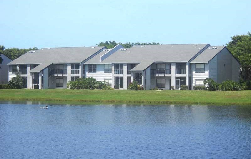 a building on the other side of a body of water