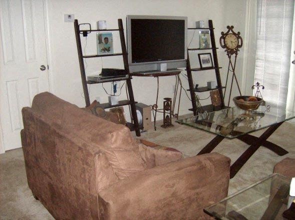 a living room with a couch and a television