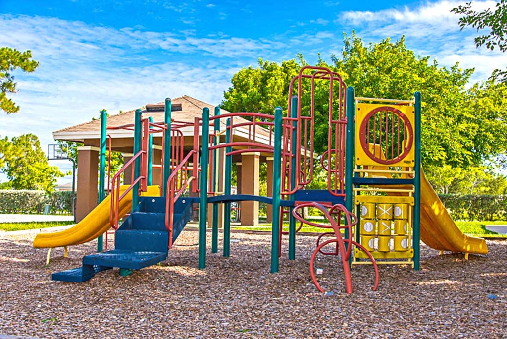 a playground with a slide and other toys