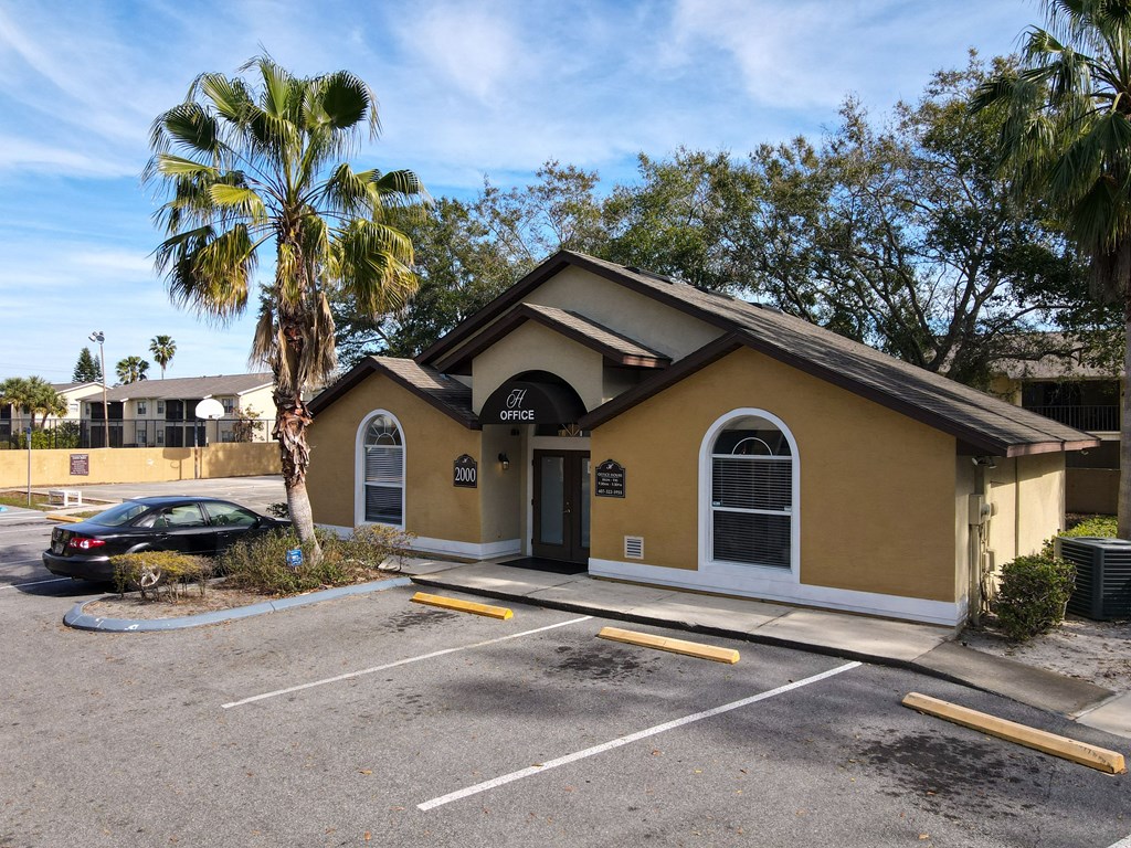 a building with a car parked in front of it