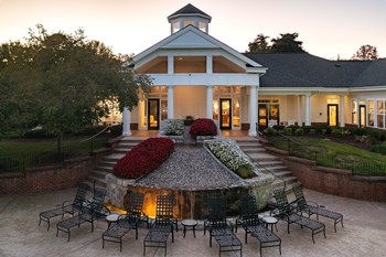 Outdoor courtyard with fire pit at Abberly Green Apartment Homes, Mooresville, North Carolina - Photo Gallery 51