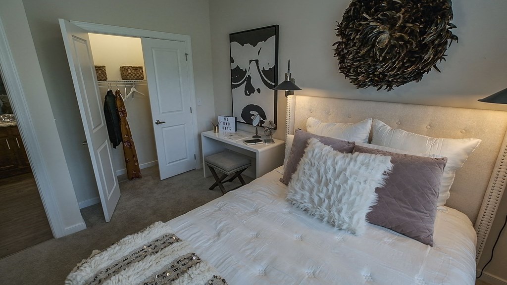Cozy bed in bedroom at Abberly CenterPointe Apartment Homes, Midlothian, 23114