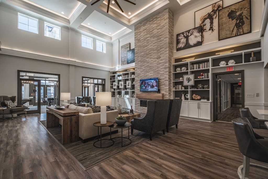 Large Clubhouse With Ample Sitting And Television at Abberly CenterPointe Apartment Homes by HHHunt, Midlothian, VA