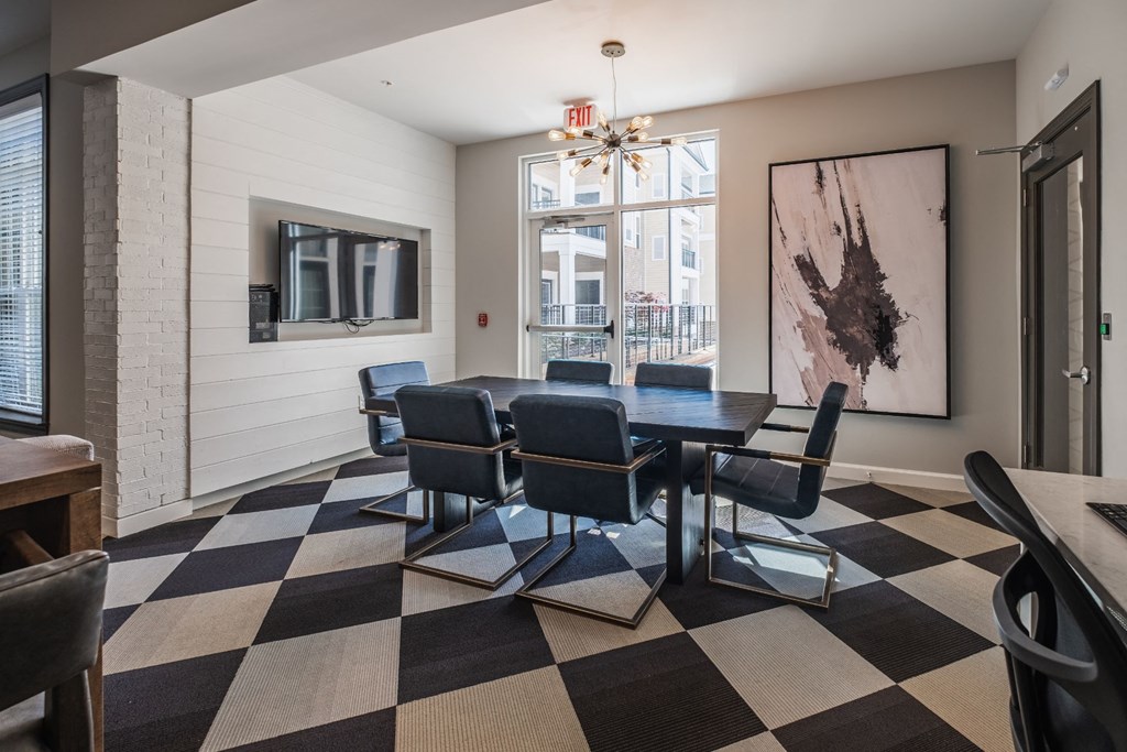 Conference Room With Tv Conference Room With Tv at Abberly CenterPointe Apartment Homes by HHHunt, Virginia